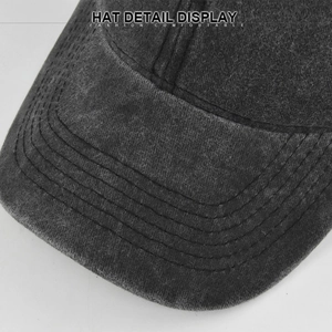 Macro shot of reinforced multi-row stitching on washed cotton baseball cap brim