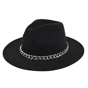 Detail of wide-brimmed black wool felt jazz hat with stylish silver metal chain trim