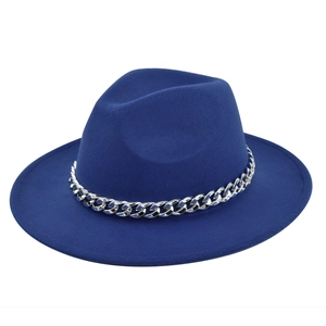 Royal blue wool fedora hat with a bold silver metal chain band and flat wide brim