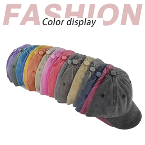 Detailed color display of vintage washed cotton baseball caps in multiple solid shades