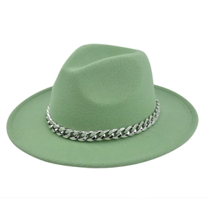 Detail of mint green wool fedora hat featuring a stylish silver metal chain decoration