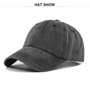 Detail view of washed cotton vintage baseball cap in dark grey with classic six-panel design
