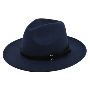 Close-up of dark blue fedora hat with black suede band and golden ring detail