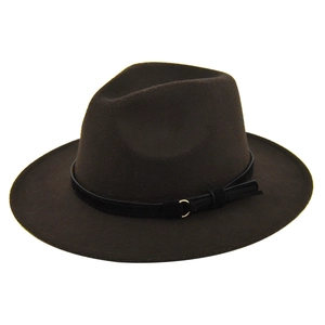 Detail of dark brown fedora hat with a black leather band and golden D-buckle ornament