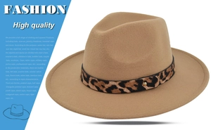 Detail view of khaki wool fedora hat featuring a stylish leopard print band and gold stud