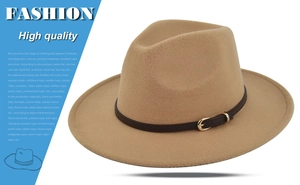 Detail shot of camel felt fedora hat featuring dark brown leather band and golden buckle