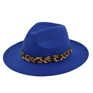 Royal blue wool fedora hat with leopard print band and gold buckle on white background