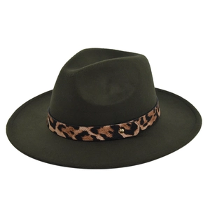 Detail of dark green wool fedora hat featuring leopard print belt and golden buckle