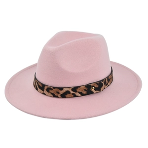 Detail of pink wool fedora hat featuring a leopard print belt and golden stud accent