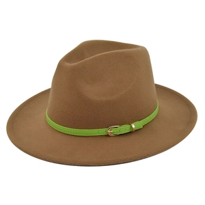 Close-up of brown wool fedora hat featuring a neon green belt and golden buckle detail