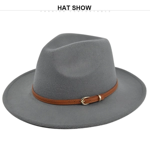 Detail view of a grey wool fedora hat with a brown leather belt and golden metal buckle