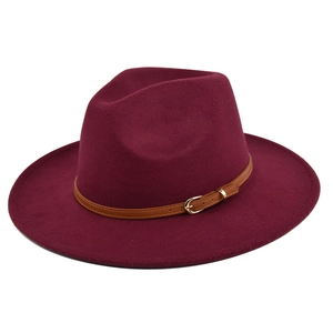 Detail of dark burgundy wool fedora featuring thin brown leather belt and gold buckle