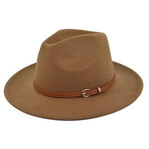 Detailed close-up of camel wool fedora hat featuring a brown leather band and gold buckle