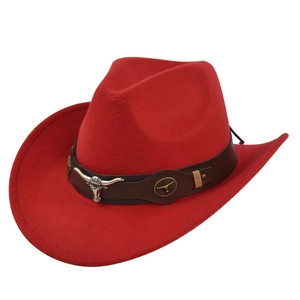 Close-up of red cowboy hat with leather band and silver steer head metal ornaments