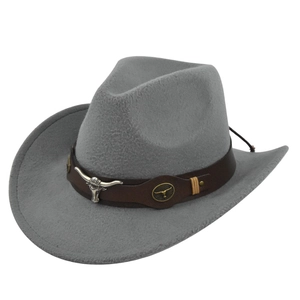 Gray felt cowboy hat with brown leather band and silver bull head ornament on white background