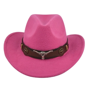 Detailed view of hot pink felt cowboy hat with silver bull head metal ornament
