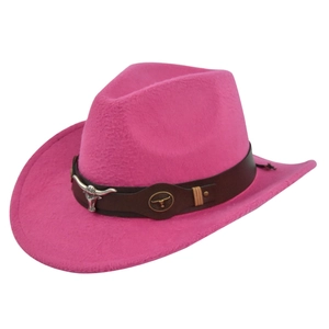 Detail of pink cowboy hat featuring silver bull head emblem and leather decorative band