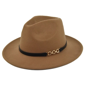 Close-up of camel wool fedora hat with black leather band and gold chain buckle detail