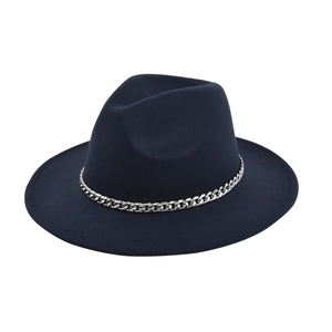 Close-up of a navy wool fedora hat featuring a chunky silver metal chain detail