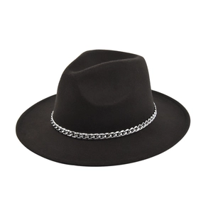 Close-up of black wool felt fedora featuring a shiny silver Cuban link chain decoration