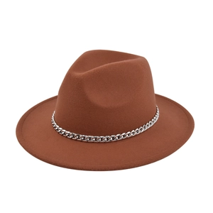 Detail of caramel wool fedora hat featuring a chunky silver chain decorative band