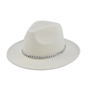 Detail of wide brim beige wool fedora featuring a silver metal chain accessory band