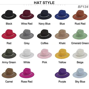 Flat lay of wool fedora hats with silver chain trim in 19 assorted vintage colors