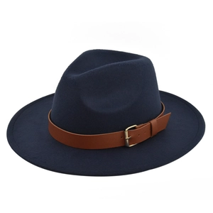 Detailed side view of navy wool fedora hat with brown leather belt and golden buckle