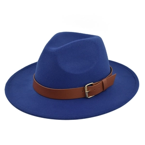 Detail of navy blue wool fedora hat featuring a brown leather band and gold metal buckle