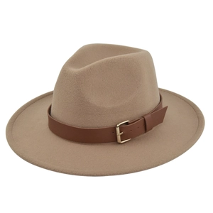 Detail shot of khaki fedora hat featuring a brown leather band and gold buckle accent