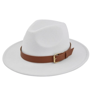 Detail of white felt fedora hat with a brown leather strap and gold metallic buckle