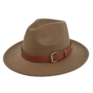 Detail of dark brown felt fedora hat featuring a leather band and silver metal buckle