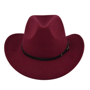 Detail view of burgundy felt wide-brim hat featuring black belt and metal buckle