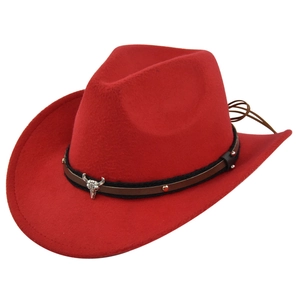 Red felt cowboy hat with wide brim featuring a leather band and silver bull skull ornament