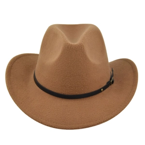 Detail of a brown felt cowboy hat with a black leather band and golden buckle