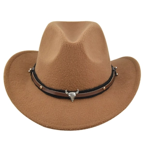 Detail of western cowboy felt hat with silver bull head metal ornament and woven band