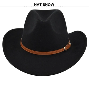 Detail of black felt fedora hat featuring brown faux leather strap and golden metal buckle