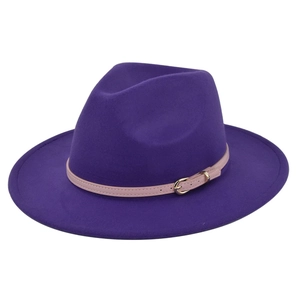 Detailed view of dark purple fedora hat with light pink leather belt and golden buckle