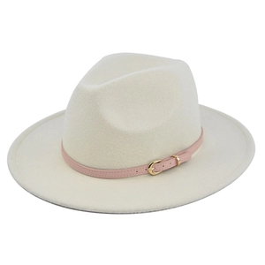 Close-up of beige fedora hat with a pink leather band and elegant gold metal buckle detail