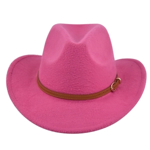 Detail of rose pink felt cowboy hat showing wool texture and brown leather belt buckle