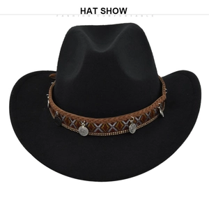 Detail of black felt cowboy hat featuring a braided brown band with silver coin charms