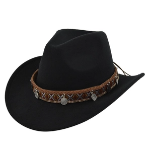 Detail of felt cowboy hat featuring ethnic pattern ribbon and vintage silver coin charms