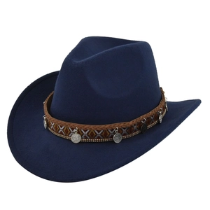 Detail of navy felt cowboy hat featuring bohemian band and silver coin pendants