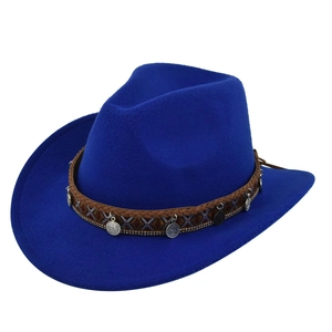 Detail of royal blue felt cowboy hat with ethnic braided band and silver coin pendants