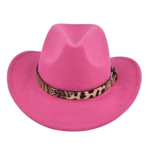 Detail of pink felt cowboy hat featuring leopard print band and silver metal buckle