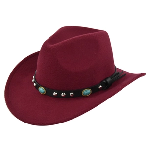 Close-up of burgundy felt cowboy hat with turquoise and silver studded leather band