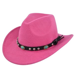 Detail of hot pink felt cowboy hat with turquoise beads and silver stud decorations