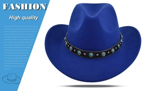 Close-up of royal blue wool cowboy hat with turquoise gemstone and silver studded band