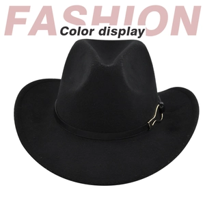 Detail of black felt cowboy hat with leather band and gold metal buckle on white background