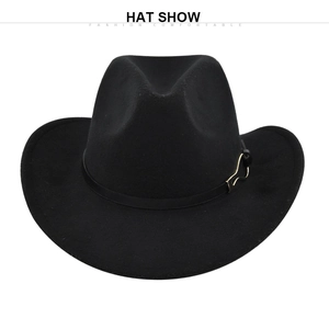 Detailed close-up of a black felt cowboy hat with a golden horse head buckle decoration